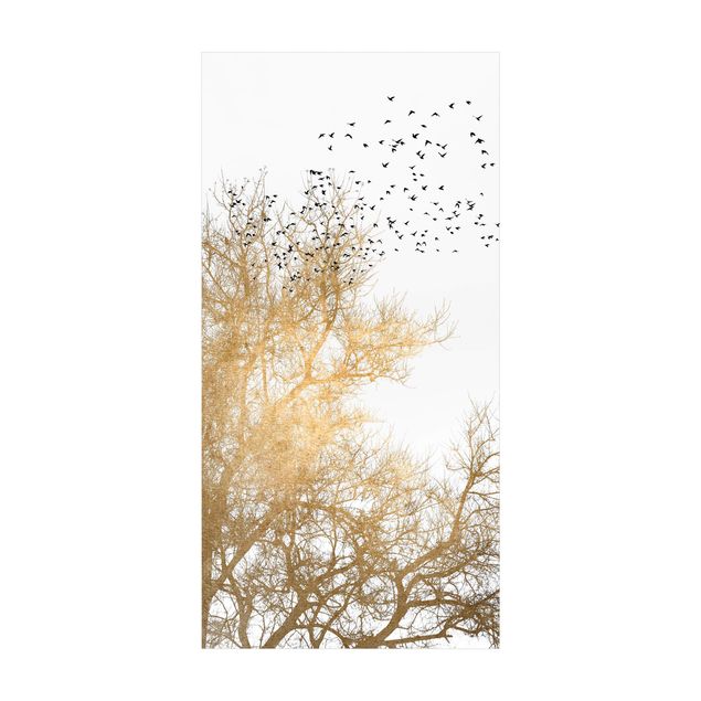 tapis modernes Foule d'oiseaux devant un arbre doré