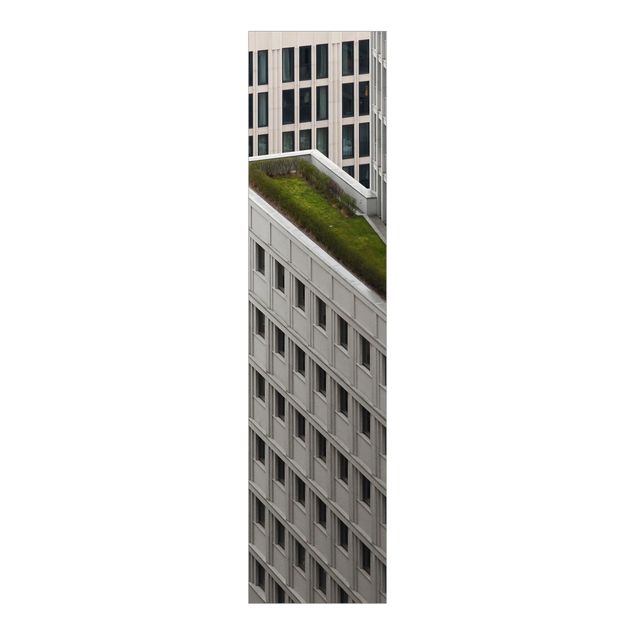 Panneaux coulissants avec architecture et skyline L'élément vert