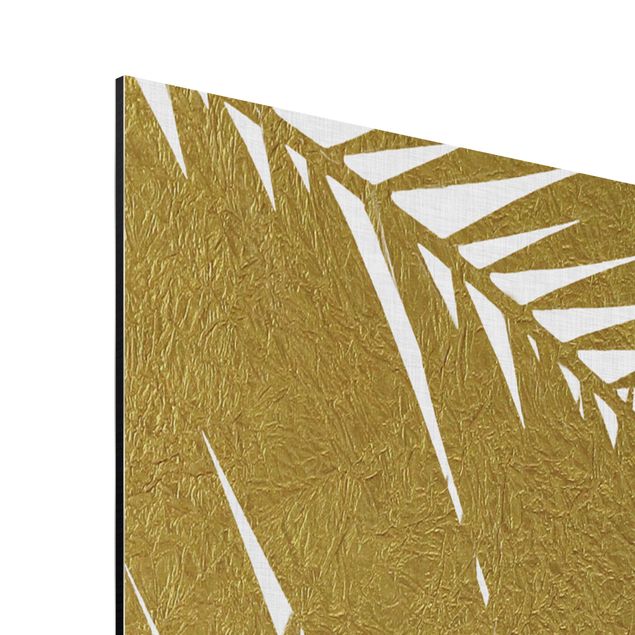 Tableau nature Vue à travers des feuilles de palmier dorées