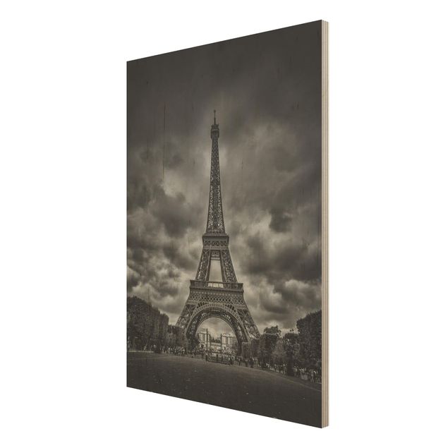 Tableaux en bois Tour Eiffel devant des nuages en noir et blanc