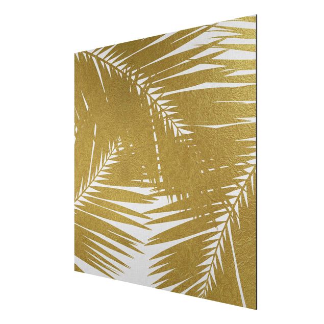 Tableau moderne Vue à travers des feuilles de palmier dorées