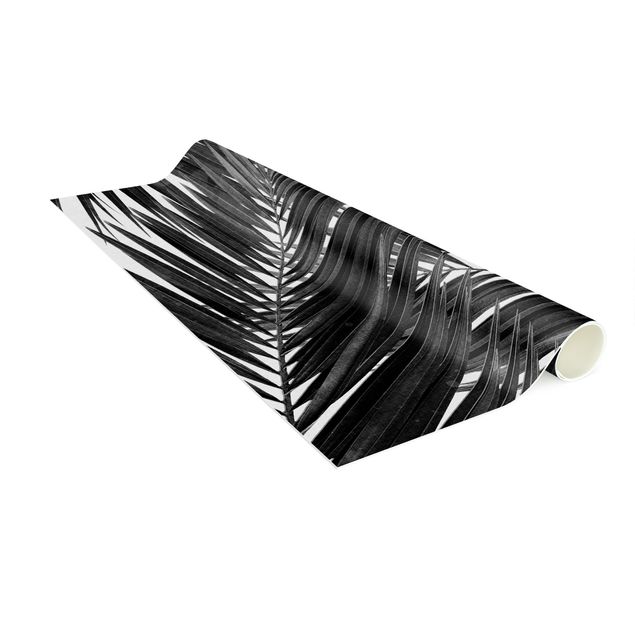 tapis salon moderne Vue sur des feuilles de palmier noir et blanc