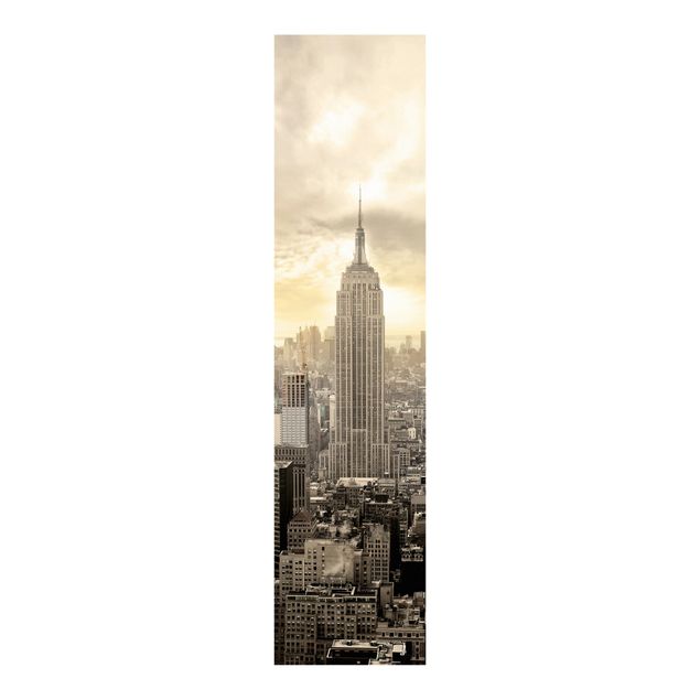 Panneaux coulissants avec architecture et skyline Manhattan à l'aube