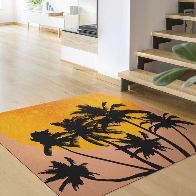 tapis chambre jungle Palmiers devant un soleil doré