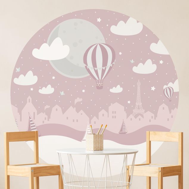 Décoration chambre bébé Paris avec étoiles et montgolfière en rose