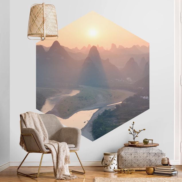 Papier peint moderne Lever de soleil dans un paysage montagneux