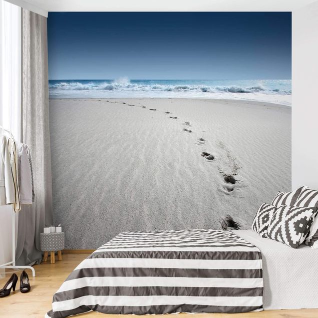 Papier peint panoramique mer Traces dans le sable