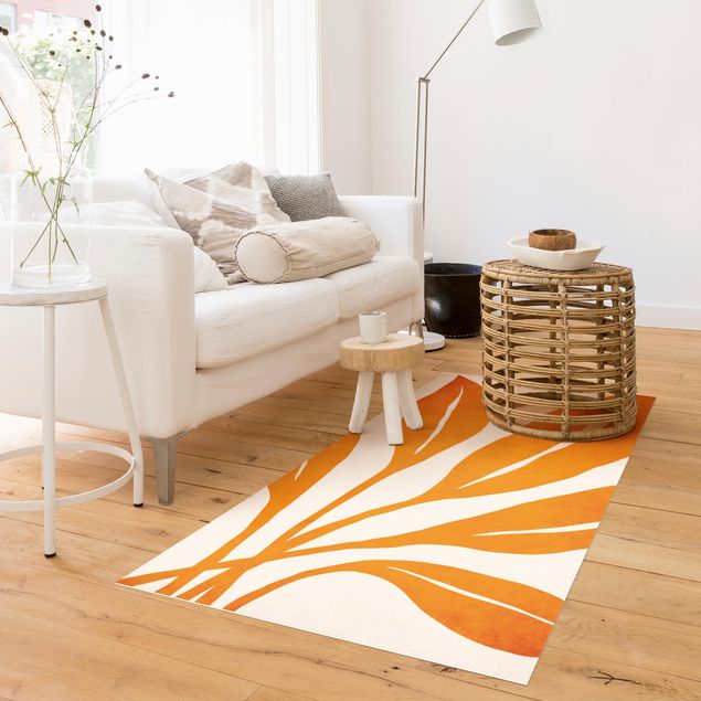 tapis salon moderne Feuilles rayonnantes en orange
