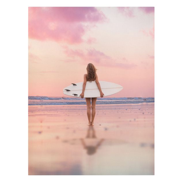 Tableau moderne Surfeuse avec une planche au coucher du soleil