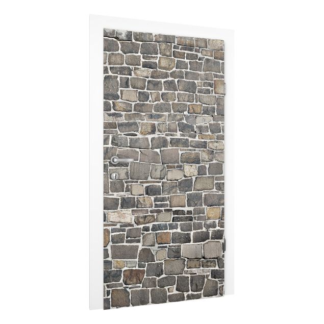 Papier peint pierre naturelle Mur de pierres concassées
