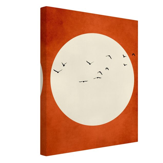 Tableaux moderne Volée d'oiseaux dans un coucher de soleil rouge