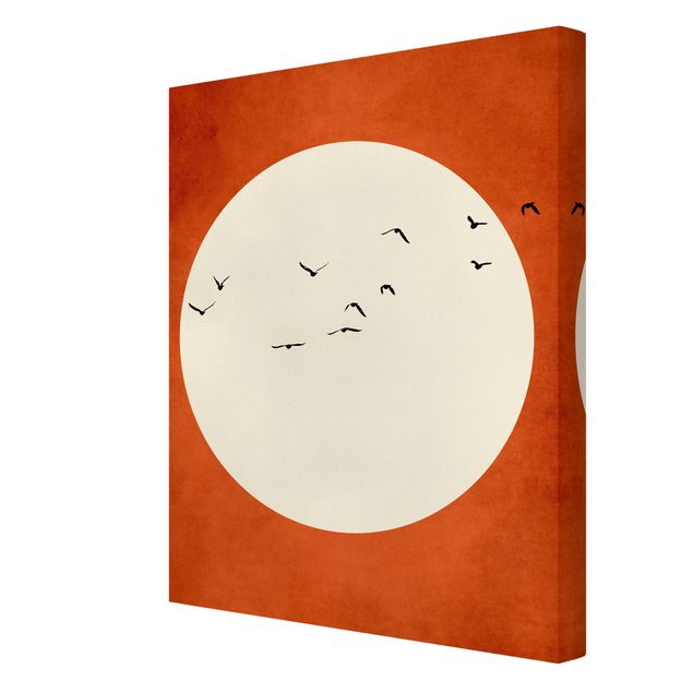 Tableau deco nature Volée d'oiseaux dans un coucher de soleil rouge