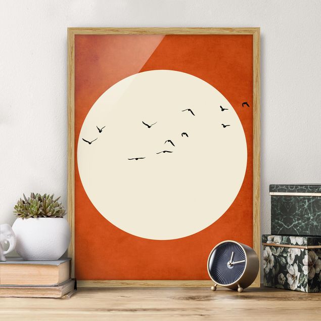 Tableau paysages Volée d'oiseaux dans un coucher de soleil rouge