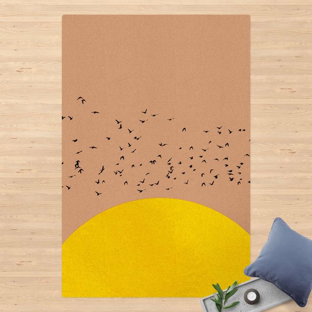 tapis contemporain Foule d'oiseaux devant un soleil jaune
