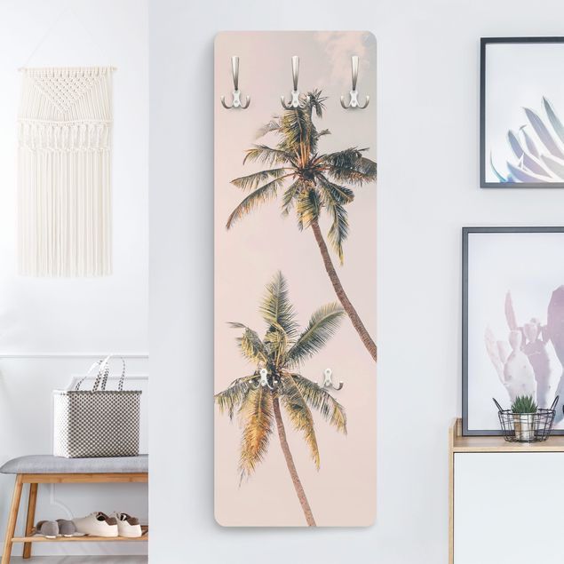 Porte-manteaux muraux avec fleurs Two palm trees against a pink sky